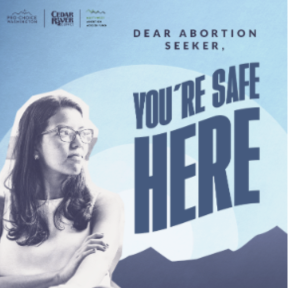 Blue pro-choice billboard from the Northwest Abortion & Gender Justice Coalition that protects abortion seekers.