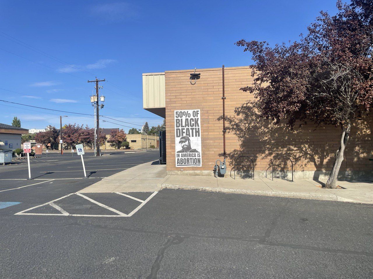 Anti-abortion quote from Kanye West posted on the side of Yakima's Planned Parenthood.