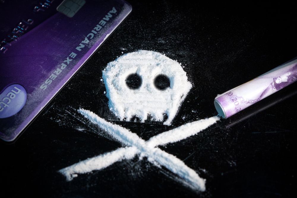 White powder making a skull and cross bones.